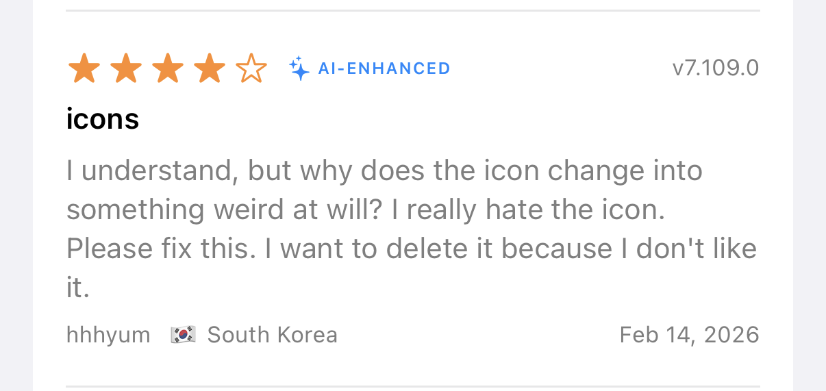 Same review translated to English with AI-ENHANCED badge showing on-device intelligence at work